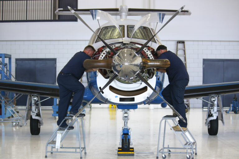 aviation jobs like aircraft mechanics working on a Pilatus plane