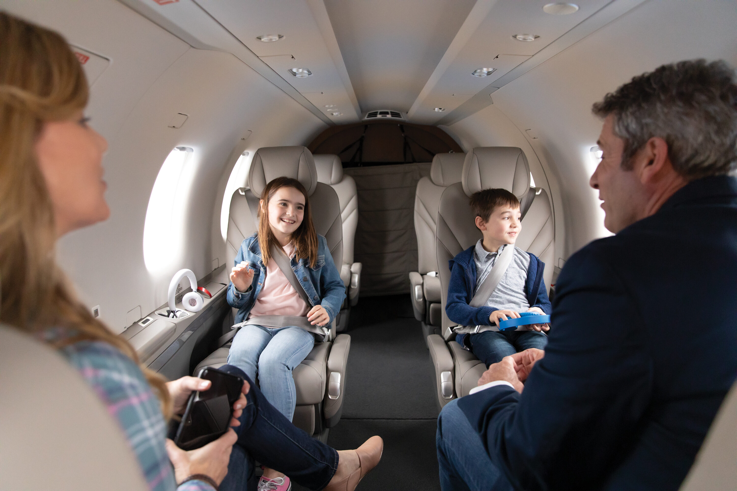 Family enjoying the Pilatus PC-12 NGX interior