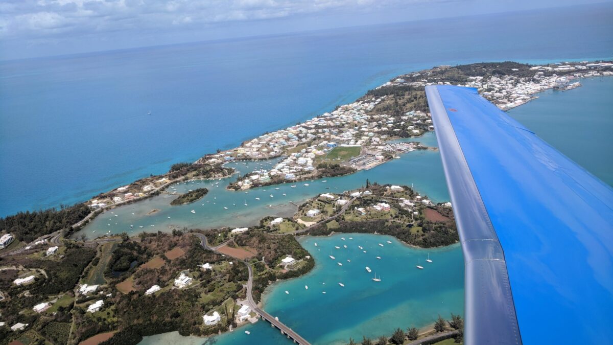 PlaneSense aircraft flying over Bermuda.