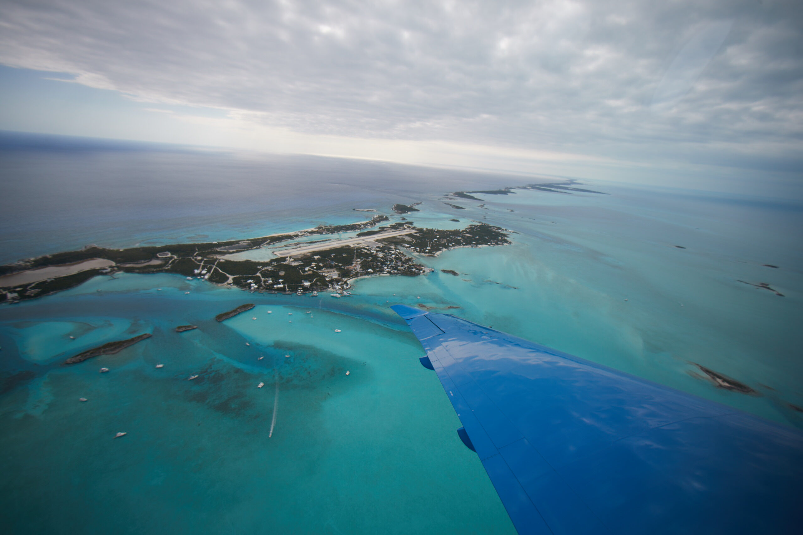 Wing View of Staniel Cay from a Pilatus PC-24 Private Jet